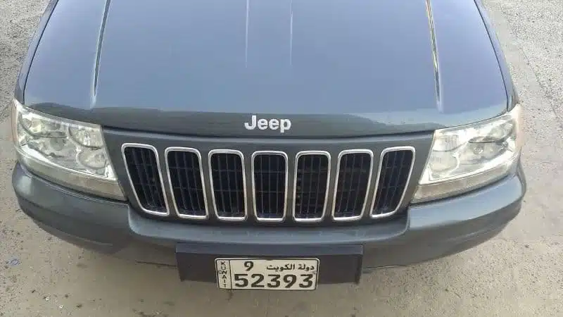 how to open jeep cherokee hood